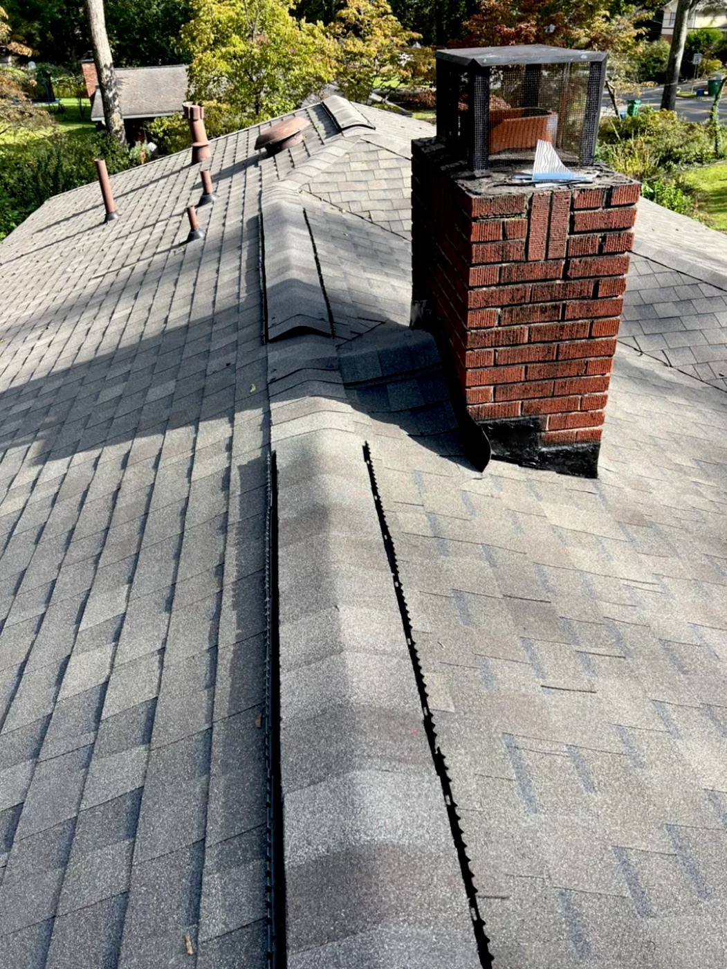 Roof after replacement with new shingles